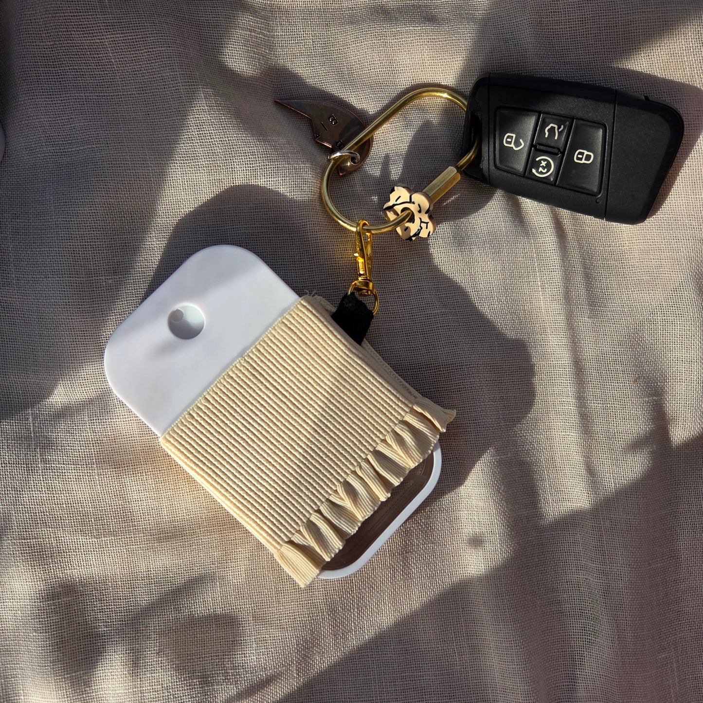 HAND SANI SKIRT KEYCHAIN