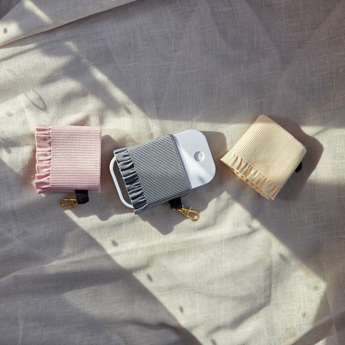 HAND SANI SKIRT KEYCHAIN